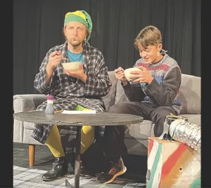 Buddy and his brother (Daryan Barati) enjoy a breakfast of cold spaghetti topped with maple syrup.